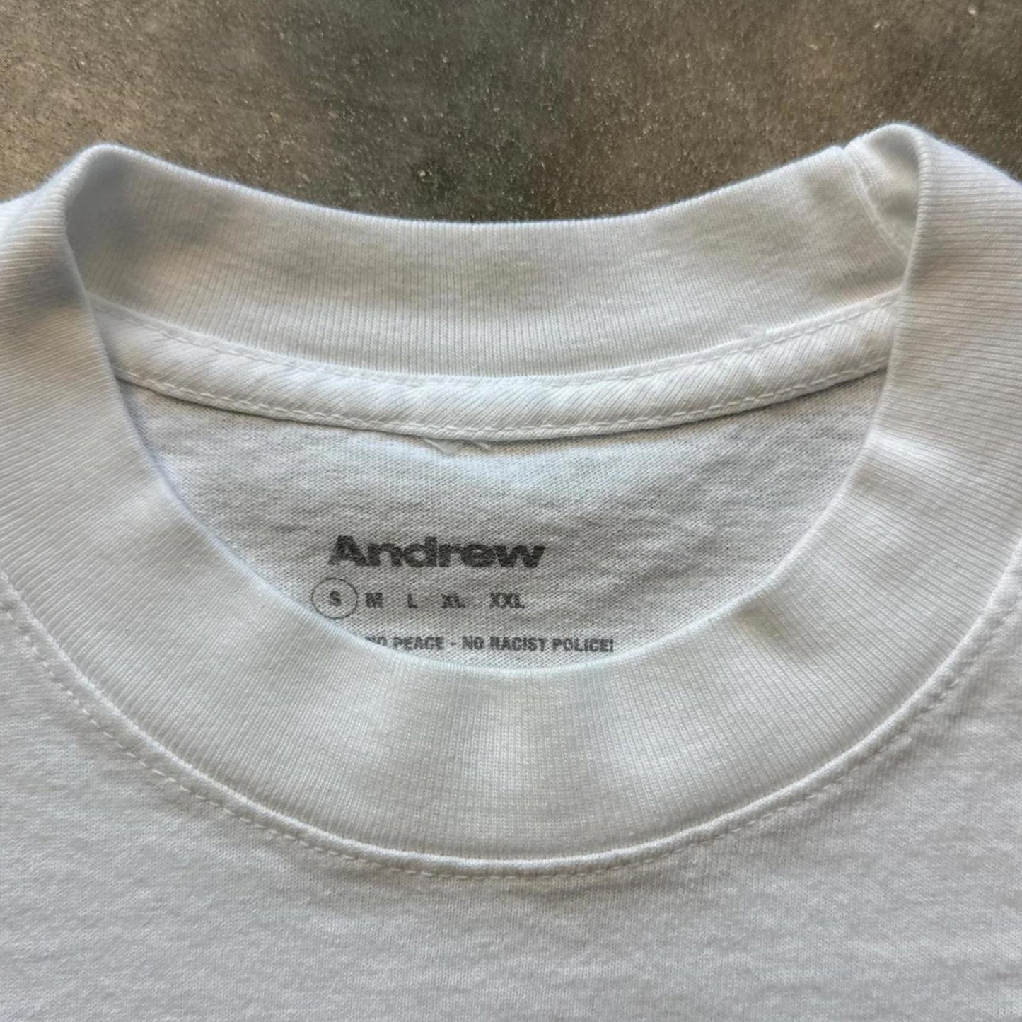 Andrew Stomp On "Racism" T-Shirt With Bold Red & Black [COPY]