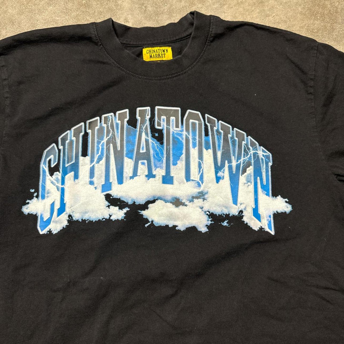 Chinatown Market Lighting Clouds Skating Graphic T-Shirt [COPY]